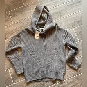 Women’s gray knit hooded sweater. New with tags, size medium.